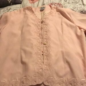 A light peach color blouse.